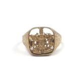 A gentleman's 1960s 9ct gold signet ring the face pierced and engraved with the Royal Coat of