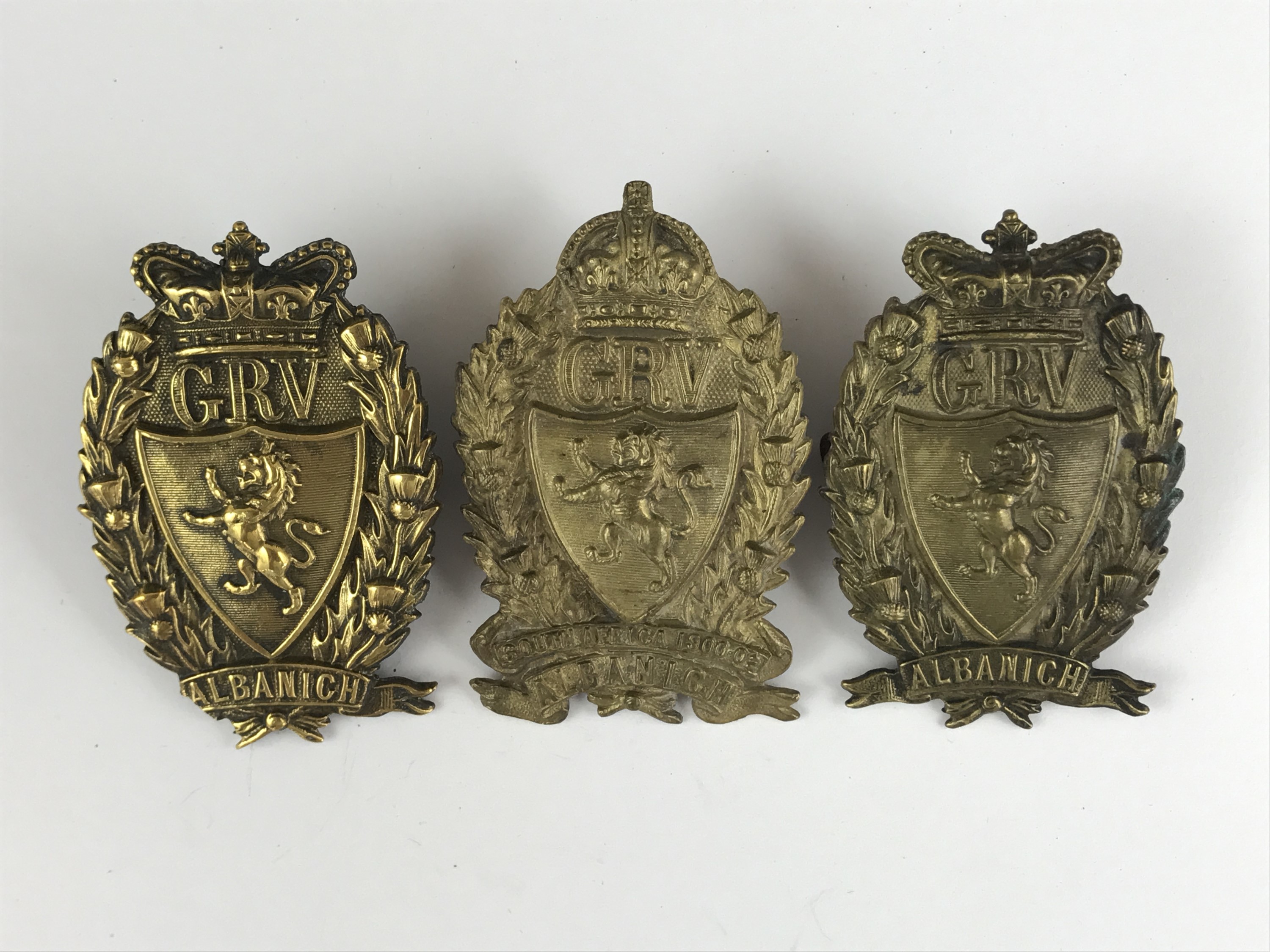 Three Galloway Rifle Volunteers cap badges