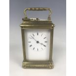 A late 19th Century English carriage clock with repeat mechanism, 12 cm excluding handle