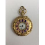 A Victorian lady's 15ct gold cased half hunter fob watch, having a foliate engraved case and a