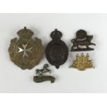 A small quantity of brooched cap and collar badges