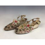 A pair of late 1930s Chinese embroidered "wedge" sandals retailed by Yau Sun, decorated with satin-