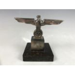 A German Third Reich electroplate and marble desk ornament, in the form of an army eagle on plinth