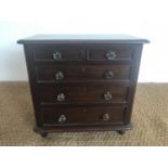 A Victorian miniature mahogany chest of drawers of uncommonly large size for such, 51 cm x 31 cm x