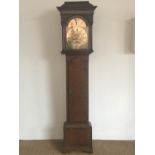 A George III 8-day long case clock by H Rendell of Tiverton, having an arched brass face, with