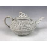 A 19th Century Wedgwood salt-glazed stoneware teapot, of lenticular form and diminutive stature,