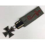 An Imperial German Iron Cross second class affixed to a Luftschiffer battalion shoulder strap
