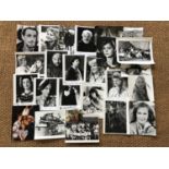 A number of signed promotional stills and candid photographs of Hollywood "A-list" film stars and