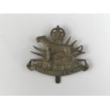 A pre-1952 Nyasaland Police cap badge