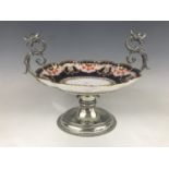 A late 19th Century Copeland Imari pattern tazza, the cusped porcelain dish being hand-enamelled and