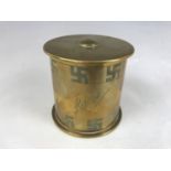 A trench art tobacco jar fabricated from Imperial German artillery shell cases and a button,