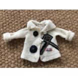 A 1940s child's knitted woollen cardigan decorated with various items of Royal Navy insignia