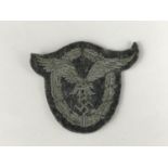 A German Third Reich Luftwaffe pilot's embroidered badge