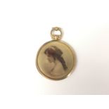 A 9ct gold framed pendant double locket, containing the Edwardian photographic portrait of a young