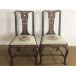 A pair of 18th Century ivory-inlaid standard chairs