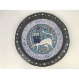 A Syrian cuerda seca enamelled copper plate, 25 cm