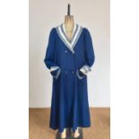 An Edwardian lady's petrol-blue cotton-twill walking / promenade coat, double-breasted, having a