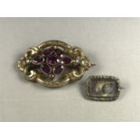 A Victorian pink paste and rolled gold brooch, the faceted stones rub-set and clustered to the