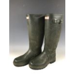 A pair of Hunter Wellington boots, size 8