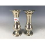 A pair of George V silver baluster-form bud vases, engraved to 'Doris' and 'Irene', loaded, 14 cm