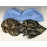 A camouflage field cap, size L, together with a camouflage hat with net and two Beechfield