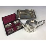 An electroplate basket and teapot together with cased teaspoons and tongs