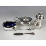 A silver condiment set together with a silver butter knife