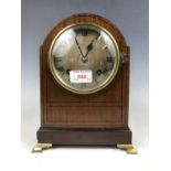 A late Victorian inlaid mahogany mantel clock