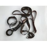 A quantity of Sam Browne and other leather belts