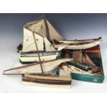 Four model boats together with a Thames barge Kathleen kit