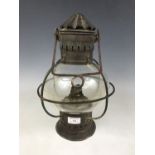 A 19th Century life boat paraffin lamp, 35 cm