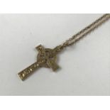 A 9ct gold Celtic cross on chain, chain stamped '9ct', 2.7g