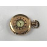 A Waltham rolled-gold half-hunter pocket watch (a/f)