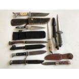 Various hunting type knives