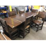 An old reproduction oak draw-leaf dining table, 137 x 84 x 75 cm, extended 208 x 84 x 75 cm,