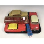 A tin plate Kapitan car together with a Mettoy bus etc