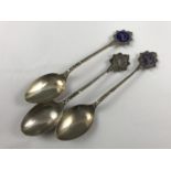 Three silver teaspoons bearing North Western Railway Regt handle terminals