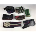 A quantity of military stable belts