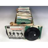 A quantity of 45 rpm singles including Procul Harum, George Harrison, Rolling Stones, The Beatles on