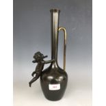 A mid 20th Century parcel-gilt bronzed vase, decorated with a putto
