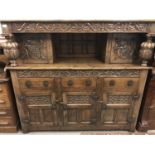 An uncommonly fine mid-20th Century carved oak court cupboard, 153 x 50 x 137 cm