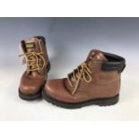 A pair of Huggs brown leather boots, size 42
