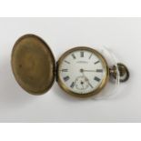 A gentleman's rolled gold Waltham hunter pocket watch, having crown wound movement, Roman numerals