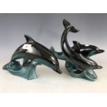 Two Poole Pottery dolphin figurines