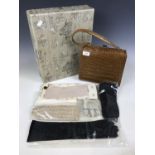 A vintage Harrods of London box containing a faux crocodile skin handbag and seven pairs of