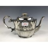 A late 19th Century electroplate tea pot