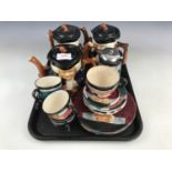 Shorter and Son Hollins Toby tea pots and derivatives, including three tea pots, a sugar pot with