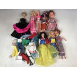 Vintage Barbie / Sindy dolls, together with clothes etc