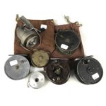 Six various vintage fishing reels including Bakelite, Alex Martin, Young's Beaudex and Turnbull of