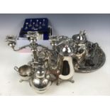 A large quantity of electroplate including a candelabra, a four-piece tea and coffee set, a large